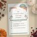 A bookmark notecard featuring fall leaves in muted colors of peach, teal, mauve, and gray. Fields in a table allow you to take notes.